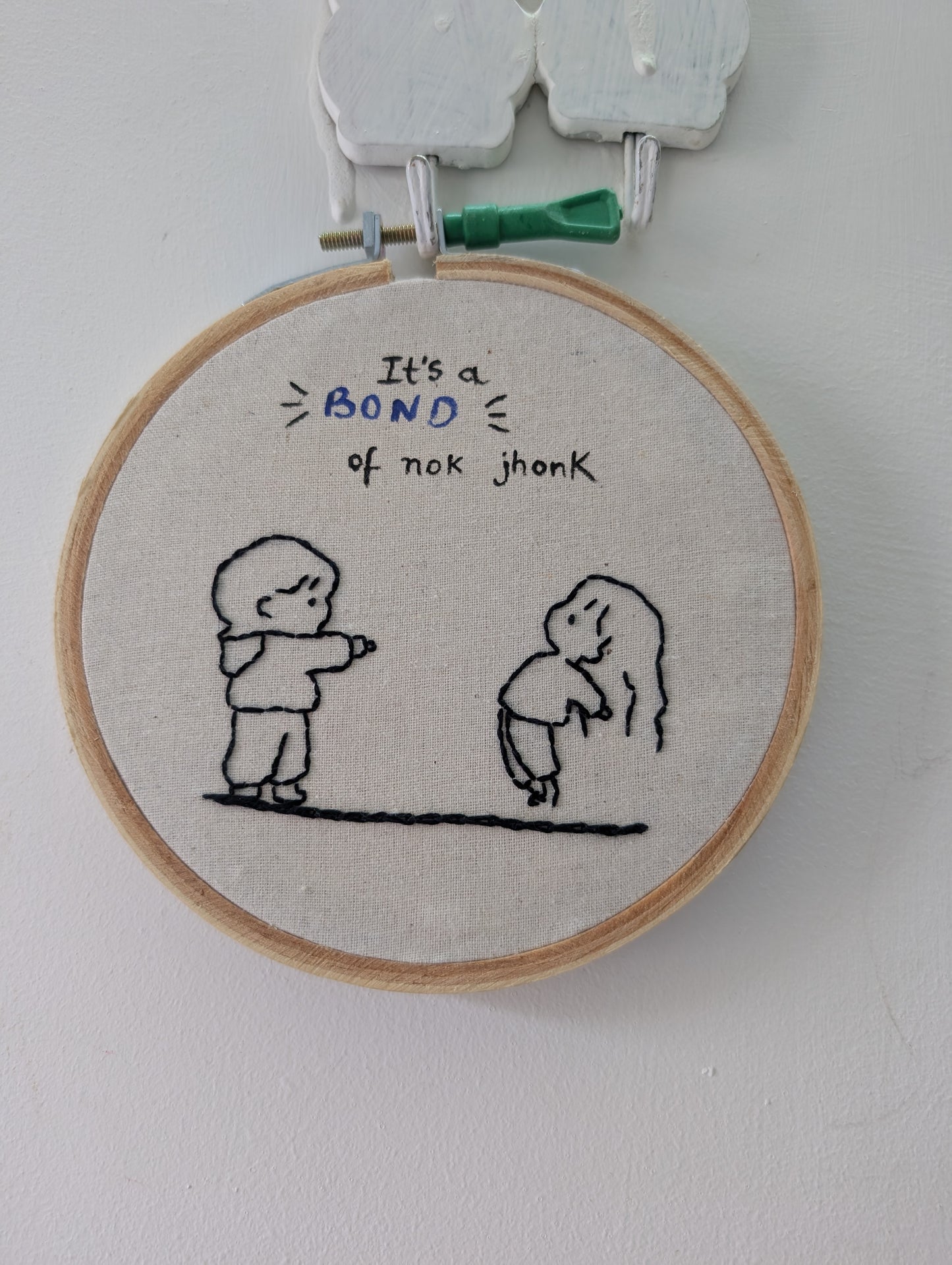 Hand Embroidered “Nok Jhok Bond” Hoop Art – 5 Inches