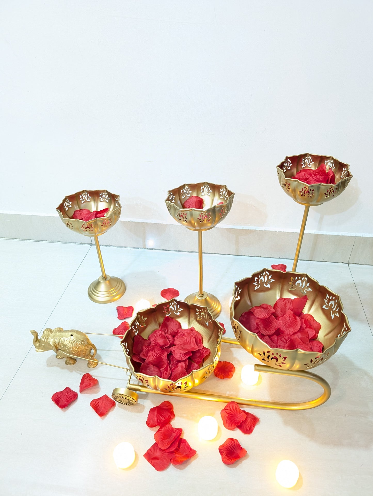 Luxury gold metal urli bowl on 24-inch stand for home décor and festive setup