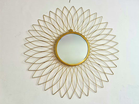 Decorative golden metal wall mirror